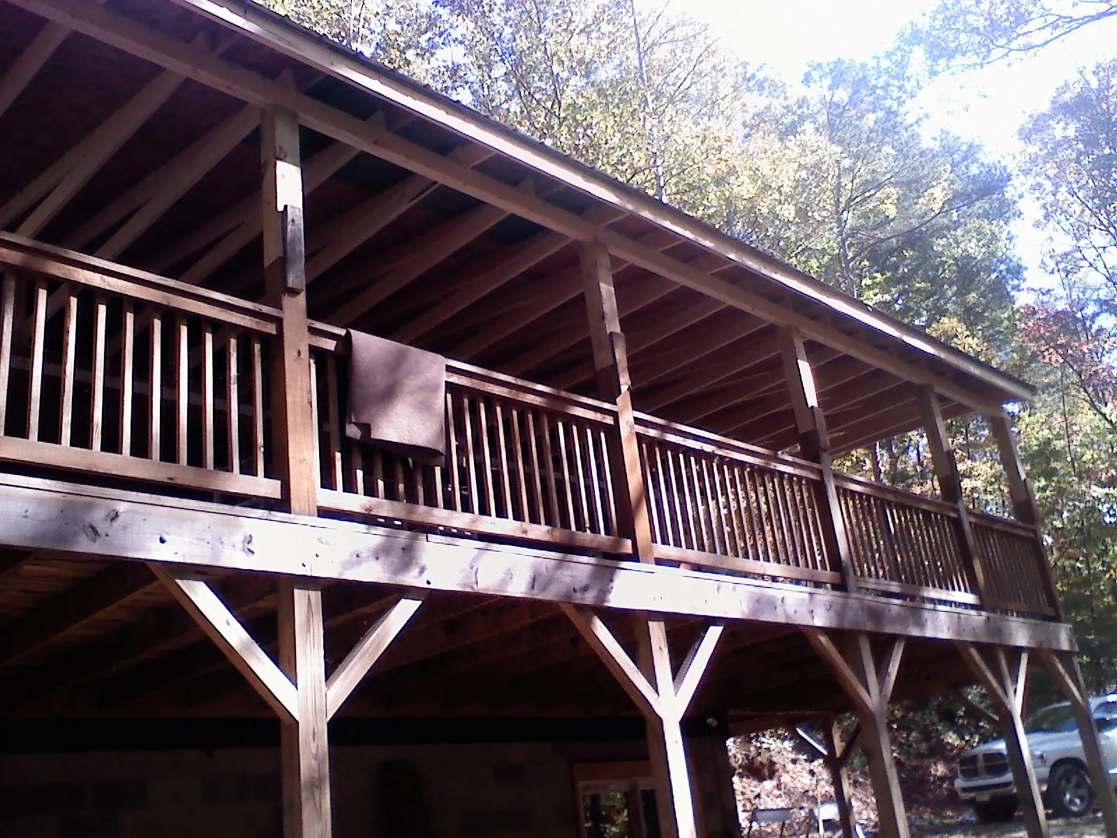 Timber framing under a new elevated porch and deck — Roof Leak Repair in Lone Oak by Roofing Brothers